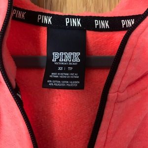 Orange sweater from Pink.